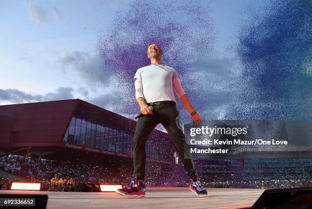 Chris Martin of Coldplay performs on stage during the One Love Manchester Benefit Concert at Old Trafford Cricket Ground on June 4, 2017 in...