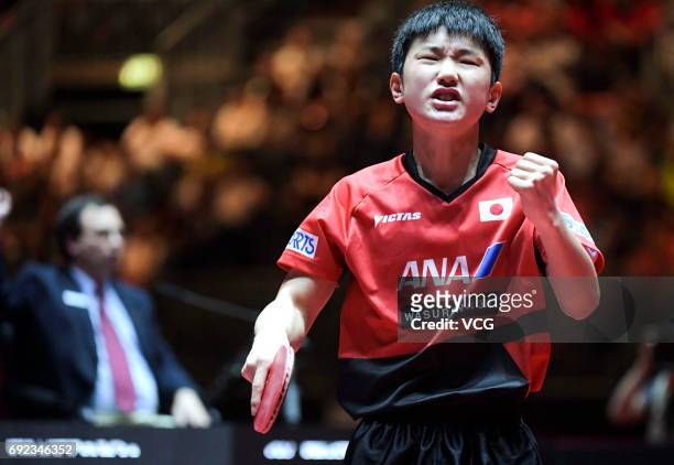 Tomokazu Harimoto of Japan competes during Men's Singles quarterfinal match against Xu Xin of China on day 7 of World Table Tennis Championships at...