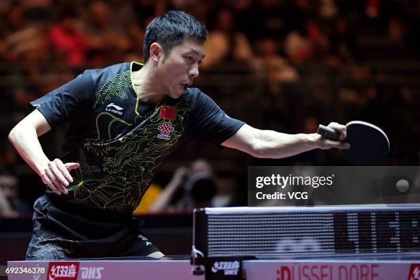 Xu Xin of China competes during Men's Singles quarterfinal match against Tomokazu Harimoto of Japan on day 7 of World Table Tennis Championships at...