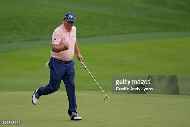 Jason Dufner reacts after making a par on the 18th hole during the final round of the Memorial Tournament at Muirfield Village Golf Club on June 4,...
