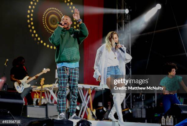 Miley Cyrus performs with Pharrell Williams during the One Love Manchester concert at Old Trafford Cricket Ground Cricket Club on June 4, 2017 in...