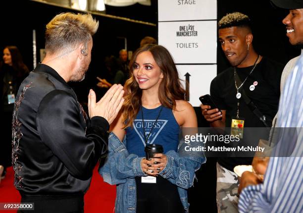 Jade Thirlwall of Little Mix talks with Gary Barlow during the One Love Manchester concert at Old Trafford Cricket Ground Cricket Club on June 4,...