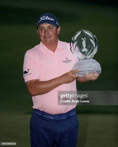 Jason Dufner poses with the tournament trophy after winning the Memorial Tournament at Muirfield Village Golf Club on June 4, 2017 in Dublin, Ohio.