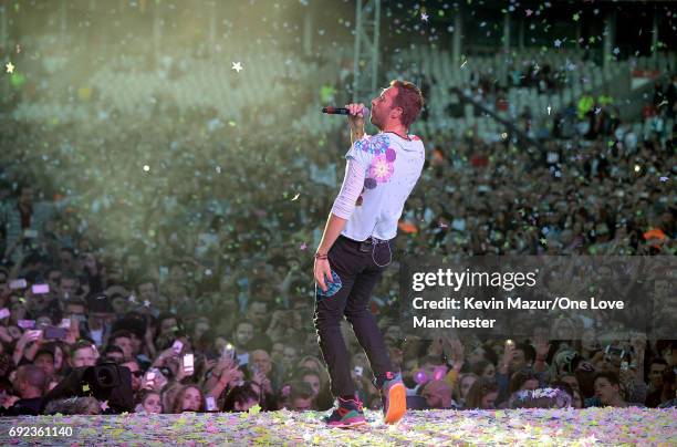 Chris Martin of Coldplay performs on stage during the One Love Manchester Benefit Concert at Old Trafford Cricket Ground on June 4, 2017 in...
