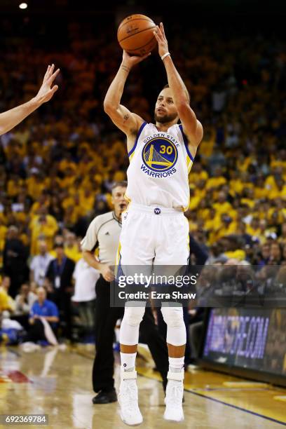 Stephen Curry of the Golden State Warriors attempts a jump shot against the Cleveland Cavaliers during the second half of Game 2 of the 2017 NBA...