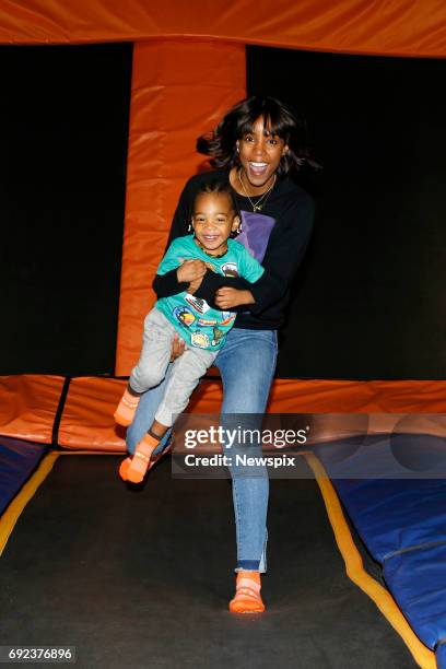 Singer Kelly Rowland with her son Titan Jewell Witherspoon enjoys the trampolines at Skyzone in Aleaxandria, Sydney, New South Wales.