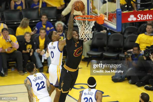 Derrick Williams of the Cleveland Cavaliers dunks against the Golden State Warriors in Game Two of the 2017 NBA Finals on June 4, 2017 at ORACLE...