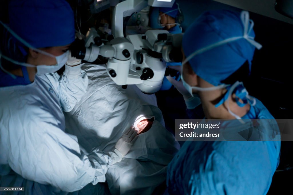 Ophthalmic surgeons performing an eye surgery