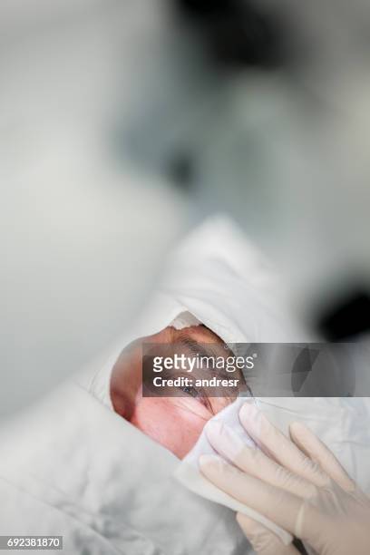 patient undergoing ocular surgery at the hospital - ocular stock pictures, royalty-free photos & images