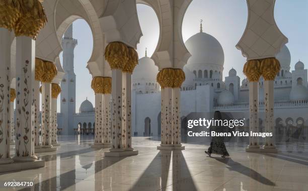 woman with abaya in a mosque - idyllic stock pictures, royalty-free photos & images