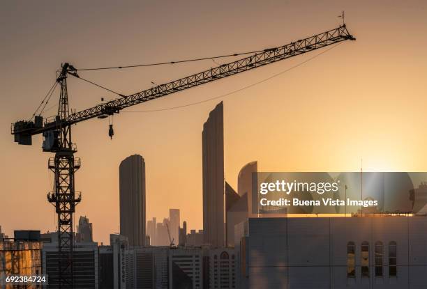 urban development in abu dhabi - abu dhabi building stock pictures, royalty-free photos & images