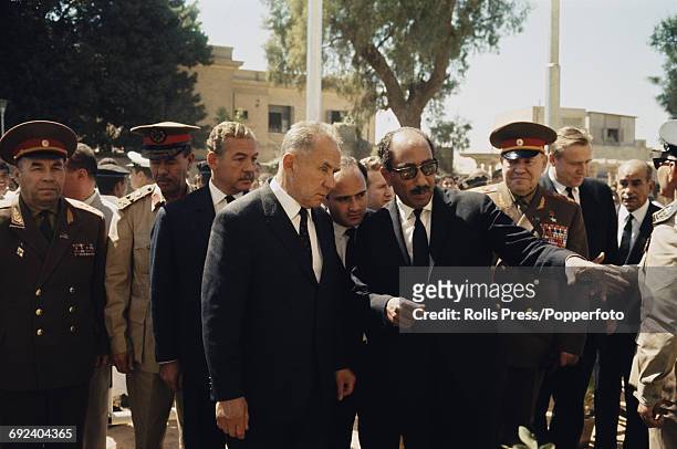 Soviet Premier and statesman, Alexei Kosygin on left and President Anwar Sadat of Egypt stand together in front of the tomb of former Egyptian...