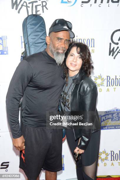 Norwood Fisher and Joyce Hyser Robinson attends Pedal On The Pier at Santa Monica Pier on June 4, 2017 in Santa Monica, California.