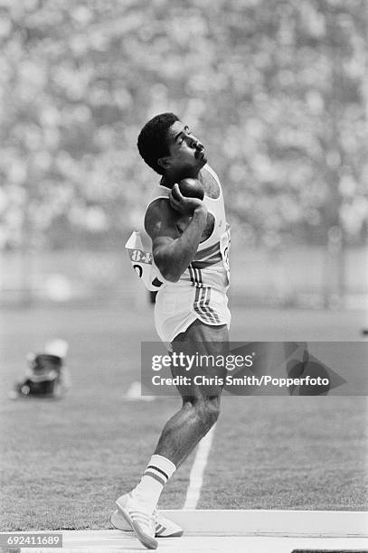 Daley Thompson of Great Britain competes in the shot put discipline on the first day of the decathlon competition at the 1984 Summer Olympics in Los...