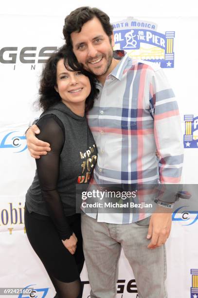 Joyce Hyser Robinson and Ben Gleib attend Pedal On The Pier at Santa Monica Pier on June 4, 2017 in Santa Monica, California.