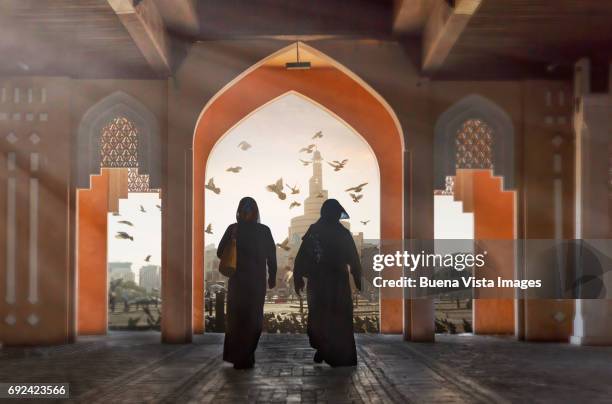 two arab women in a suck - doha foto e immagini stock