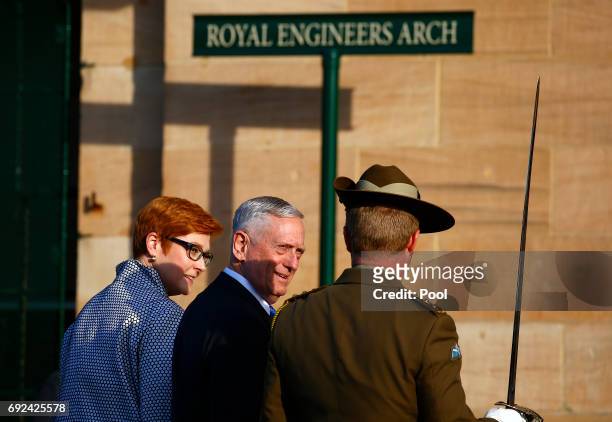Secretary of Defence Jim Mattis walks with Australia's Minister for Defence Marise Payne after an inspection of an honour guard as part of the 2017...