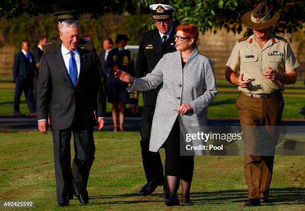 Secretary of Defence Jim Mattis walks with Australia's Minister for Defence Marise Payne before an inspection of an honour guard as part of the 2017...