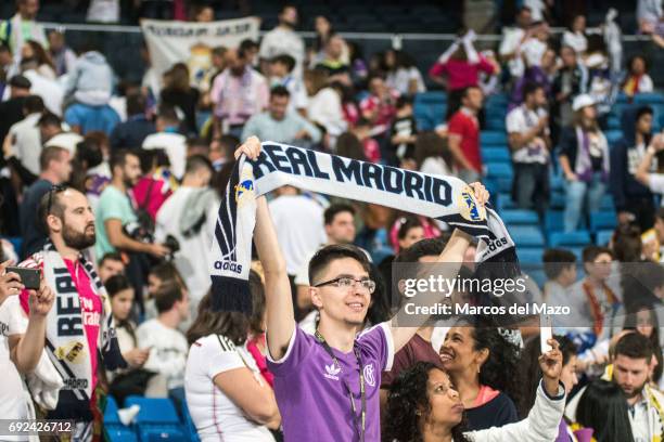 Real Madrid fan in Santiago Bernabeu stadium during the celebration of the 12th Champions League title.