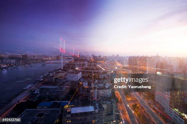 day to night timelapse timeslice panorama of shanghai downtown:nanpu bridge - day for night 2017 fotografías e imágenes de stock