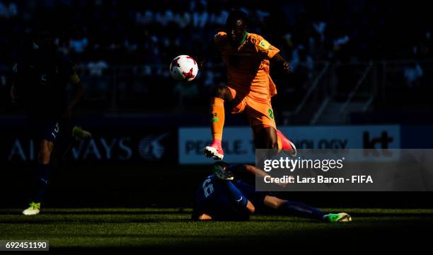 Patson Daka of Zambia jumps over Mauro Coppolaro of Italy during the FIFA U-20 World Cup Korea Republic 2017 Quarter Final match between Italy and...