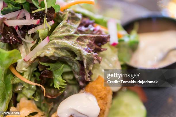 salad - essen am tisch stock pictures, royalty-free photos & images