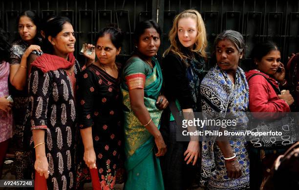 Women standing in a line for tickets for the India versus England Group B Cricket World Cup match at the M Chinnaswamy Stadium in Bangalore on...