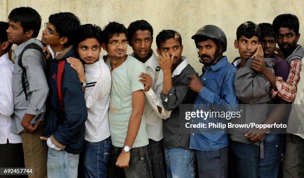 Cricket fans in a line for tickets for the India and England Group B cricket World Cup match at the M Chinnaswamy Stadium in Bangalore on February...