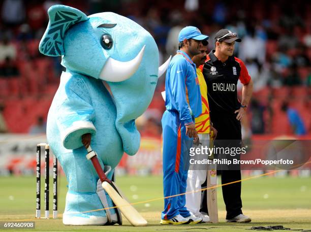 India's MS Dhoni and Andrew Strauss line up with the tournament mascot 'Stumpy' before the ICC Cricket World Cup group B match in Bangalore on...