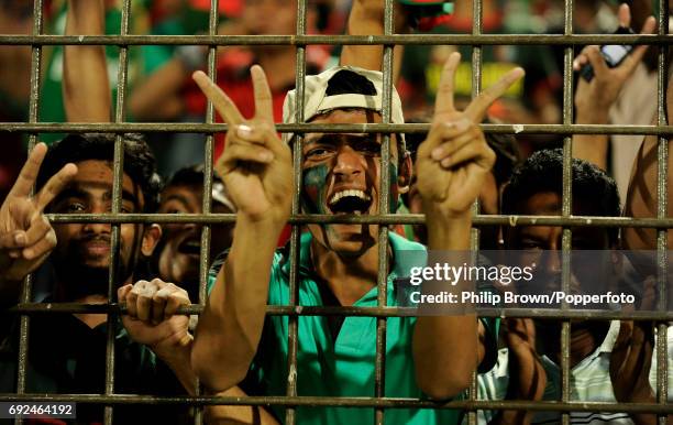 Bangladesh Fans celebrate after Bangladesh defeated England in the ICC Cricket World Cup group B match in Chittagong on March 11, 2011.