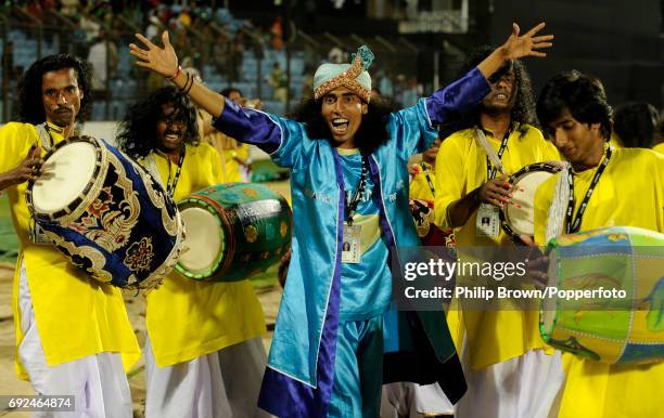 Dancer and some drummers celebrating after Bangladesh had defeated England in the ICC Cricket World Cup group B match in Chittagong March 11, 2011.