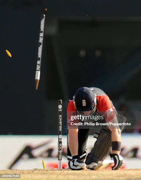 England batsman Ian Bell is bowled by West Indies' Kemar Roach during their ICC Cricket World Cup group B match in Chennai March 17, 2011.