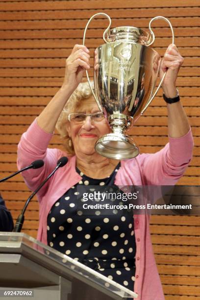 Manuela Carmena celebrates during the Real Madrid celebration the day after winning the 12th UEFA Champions League Final at Madrid town hall on June...