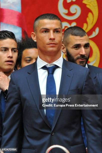 James Rodriguez, Cristiano Ronaldo and Karim Benzema celebrate during the Real Madrid celebration the day after winning the 12th UEFA Champions...