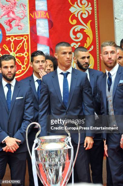 Nacho Fernandez, James Rodriguez, Cristiano Ronaldo, Karim Benzema and Sergio Ramos celebrate during the Real Madrid celebration the day after...