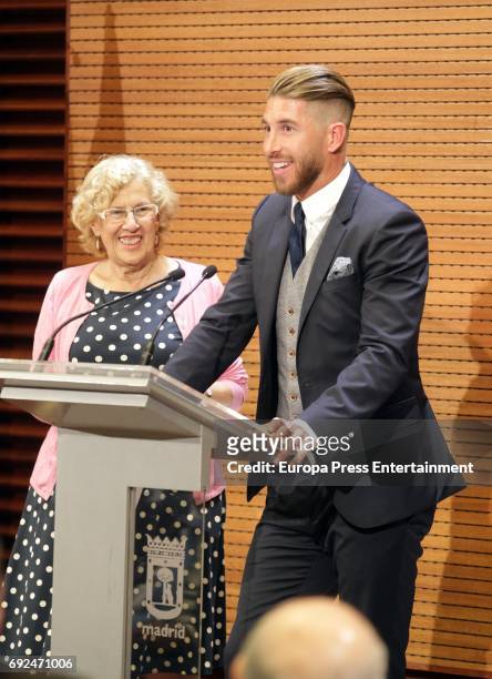 Manuela Carmena and Sergio Ramos celebrate during the Real Madrid celebration the day after winning the 12th UEFA Champions League Final at Madrid...