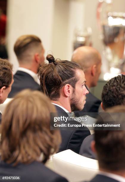 Gareth Bale celebrates during the Real Madrid celebration the day after winning the 12th UEFA Champions League Final at Madrid town hall on June 4,...