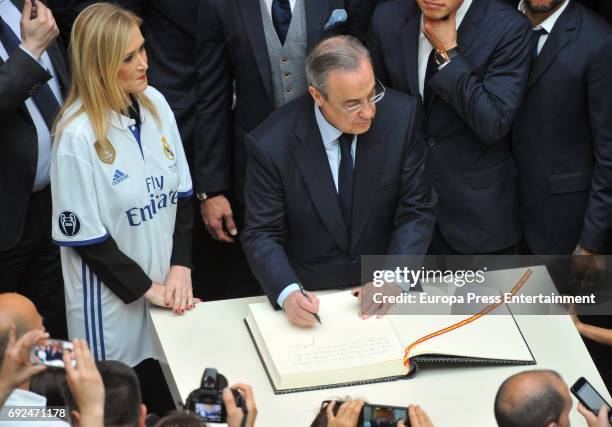 Florentino Perez and Cristina Cifuentes celebrate during the Real Madrid celebration the day after winning the 12th UEFA Champions League Final at...