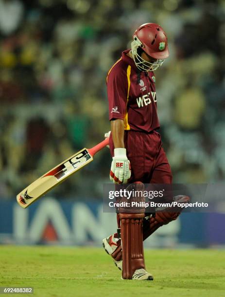 West Indies' Ramnaresh Sarwan leaves the field after being caught during an ICC World Cup Cricket match against England on the 17th of March, 2011.