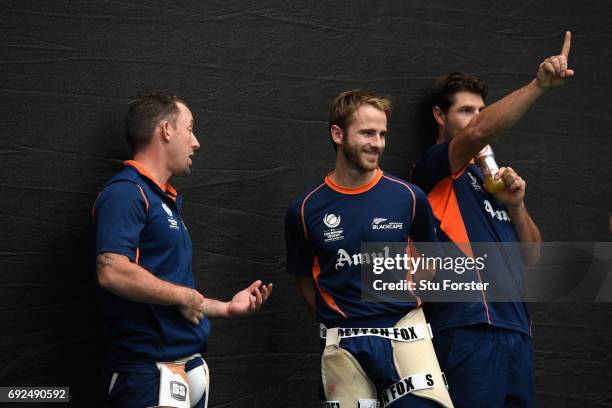 New Zealand captain Kane Williamson chats with Luke Ronchi during nets at the Swalec Stadium ahead of the ICC Champions Trophy match between England...