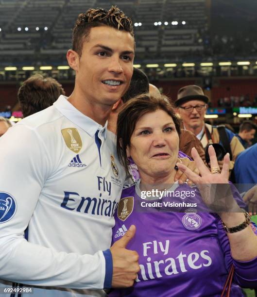 Cristiano Ronaldo poses with his mother Maria Dolores dos Santos Aveiro during the UEFA Champions League Final between Juventus and Real Madrid at...