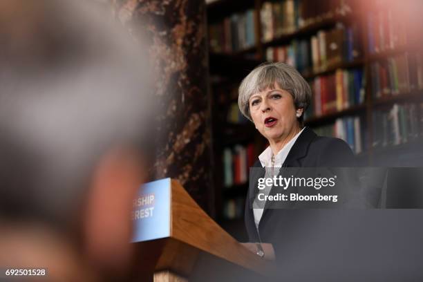 Theresa May, U.K. Prime minister and leader of the Conservative Party, delivers a speech at the Royal United Services Institute in London, U.K., on...