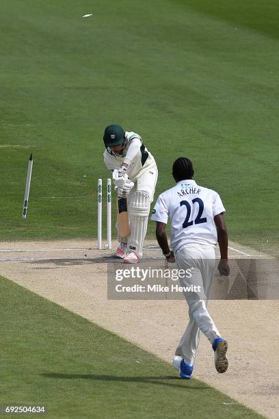 Jofra Archer of Sussex clean bowls Josh Tongue of Worcestershire during the fourth day of the Specsavers County Championship Division Two match...