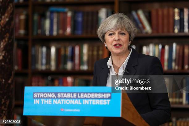 Theresa May, U.K. Prime minister and leader of the Conservative Party, delivers a speech at the Royal United Services Institute in London, U.K., on...