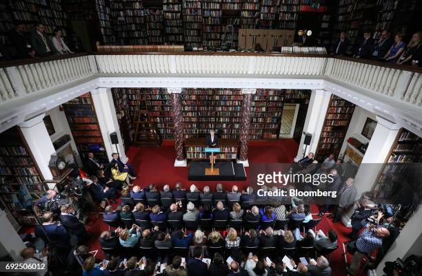 Theresa May, U.K. Prime minister and leader of the Conservative Party, delivers a speech at the Royal United Services Institute in London, U.K., on...