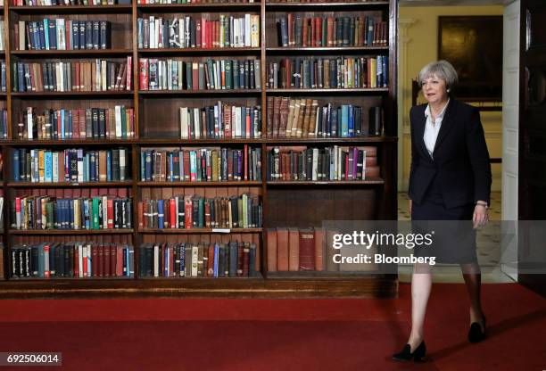 Theresa May, U.K. Prime minister and leader of the Conservative Party, arrives to deliver a speech at the Royal United Services Institute in London,...