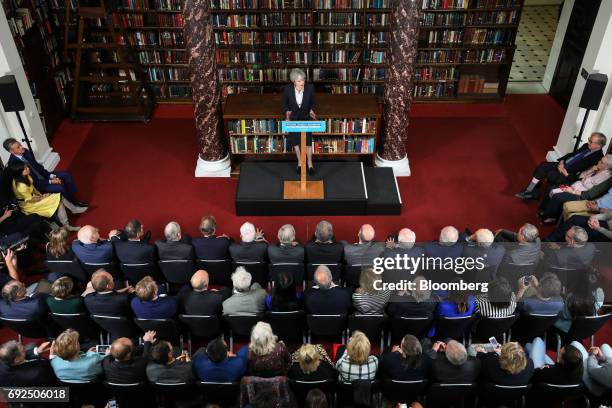 Theresa May, U.K. Prime minister and leader of the Conservative Party, delivers a speech at the Royal United Services Institute in London, U.K., on...