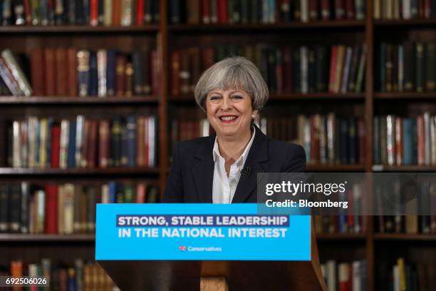 Theresa May, U.K. Prime minister and leader of the Conservative Party, delivers a speech at the Royal United Services Institute in London, U.K., on...