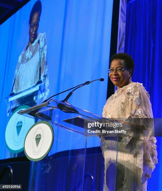 Humanitarian Graca Machel speaks after receiving the "Diamonds Do Good" Global Humanitarian Award during the Diamond Empowerment Fund's Diamonds Do...