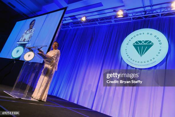 Humanitarian Graca Machel speaks after receiving the "Diamonds Do Good" Global Humanitarian Award during the Diamond Empowerment Fund's Diamonds Do...